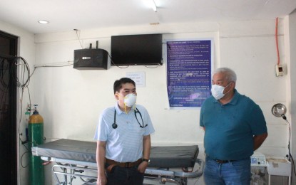 <p><strong>ISOLATION FACILITY.</strong> Angeles City Mayor Carmelo  Lazatin Jr. (right) and Rafael Lazatin Memorial Medical Center (RLMMC) head, Dr. Froilan Canlas (left) inspect on Thursday (March 19, 2020) the confinement area set up at RLMMC, or Ospital Ning Angeles, for patients under investigation (PUIs) for coronavirus disease 2019 (Covid-19). So far, there is no confirmed Covid-19 case in the city. <em>(Photo by the city government of Angeles)</em></p>