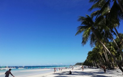 <p><strong>STRANDED IN PARADISE.</strong> Around 500 local and foreign tourists on Boracay Island are stranded in their hotels after Malay town was placed under general community quarantine on Thursday night (March 19, 2020). Malay Mayor Frolibar Bautista said on Friday (March 20, 2020) they are closely coordinating with the Department of Tourism on how to help transport the tourists home. <em>(PNA photo by Gail Momblan)</em></p>