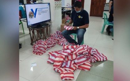 <p><strong>PROTECTION.</strong> Personal protective equipment (PPEs) is being readied for distribution to health personnel on March 19, 2020. Belison’s municipal government also provided its health workers with free rides to the provincial hospital in San Jose de Buenavista starting Friday (March 20, 2020). <em>(PNA photo by Annabel Consuelo J. Petinglay)</em></p>