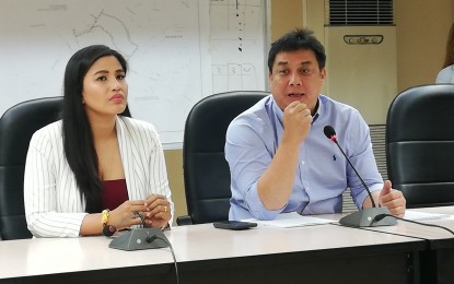 <p><strong>MMDA TOP OFFICIALS.</strong> Metropolitan Manila Development Authority (MMDA) Spokesperson Celine Pialago (left) and MMDA General Manager Jose Arturo "Jojo" Garcia hold a press conference at the MMDA headquarters in Makati City on March 12, 2020. Pialago said she and Garcia have both been exposed to a person positive of the coronavirus disease 2019 (Covid-19) and are now under self-quarantine as part of the protocol to stop the spread of the disease. <em>(File photo by Raymond Carl Dela Cruz)</em></p>