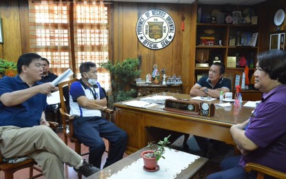 <p><strong>NO HOARDING</strong>. Governor Roel Degamo talks to members of the Provincial Price Monitoring Council to discuss possible overpricing and hoarding in Negros Oriental. Also in this photo taken last Friday (March 20, 2020) are (from left to right) businessman Danford Sy, Hermel Sun, consumer welfare desk officer of the Department of Trade and Industry; and John Jalandoni of the Negros Oriental Investment Promotion Center. <em>(Photo courtesy of the Capitol PIO)</em></p>
