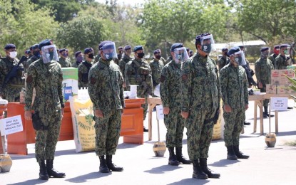 <p><span lang="EN-US"><strong>BORDER GUARDS.</strong> Police personnel from the Police Regional Office (PRO)-12 (Soccsksargen) headquarters wear their protective face shields and masks prior to their deployment on Sunday (March 22, 2020) in the border highways of the region. A total of 172 augmentation policemen were dispatched to manage the checkpoint operations in the region’s entry points. <em>(Photo courtesy of the PRO-12)</em></span></p>