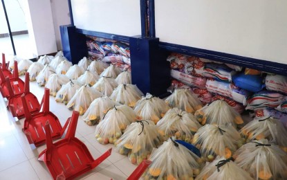<p><strong>RELIEF GOODS.</strong> The Alaminos City government distributes vegetables along with other relief items to its residents. The vegetables were bought by the city from its farmer-residents.<em> (Photo courtesy of LGU Alaminos City's Facebook page)</em></p>