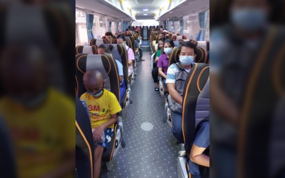 <p><strong>FREE BUS RIDE</strong>. A bus ferries patients and health workers provided for free through a public-private initiative led by the Department of Transportation (DOTr). The DOTr said the program has provided the service to a total of 17,298 persons by the end of March, or after 13 days since the program began. <em>(Photo courtesy of Philippine Coast Guard)</em></p>