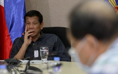 <p>President Rodrigo Roa Duterte holds a meeting with some members of his Cabinet to discuss updates on the coronavirus disease (Covid-19) at the Presidential Security Group (PSG) Compound in Malacañang Park on March 24, 2020. <em>(Presidential photo by Toto Lozano)</em></p>