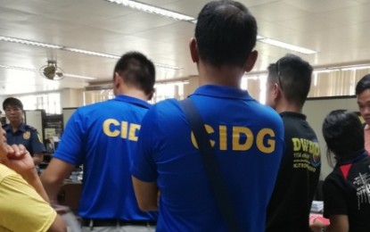 <p><strong>CASE FILED.</strong> Personnel of the Philippine National Police-Criminal Investigation and Detection Group-Western Visayas assist the minors and their parents in the filing of charges against the accused of qualified trafficking in persons before the Bacolod City Prosecutor’s Office in November last year. The De la Cerna couple and their daughter have been charged before the Regional Trial Court earlier this month. <em>(PNA Bacolod file photo)</em></p>