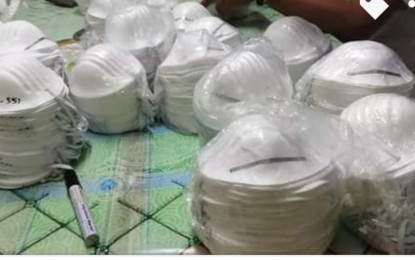 <p><strong>SUBSTANDARD</strong>. Members of the CIDG-7 seized on Thursday (March 26, 2020) seized 1,000 substandard face masks during an entrapment operation in Sibulan, Negros Oriental. Four persons were arrested<em>. (Photo by Juancho Gallarde)</em></p>