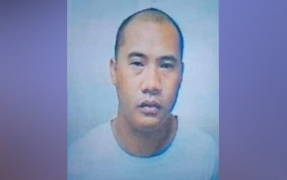 <p><strong>APPREHENDED.</strong> Central Luzon's most wanted person, Wilhem Flores, was arrested by the police in Ajuy town, Iloilo province and presented to the press on Friday (March 27, 2020). Flores, 45, a fugitive for 10 years, has three warrants of arrest and is wanted for murder and other crimes.<em> (Photo courtesy of IPPO PIO)</em></p>