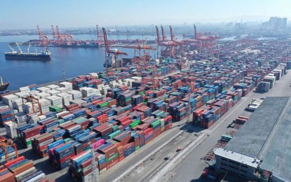 <p><strong>CARGO TERMINAL.</strong> The Manila International Container Terminal brims with cargo containers on Tuesday (March 31, 2020). In a nationwide assessment during the second half of March, the Maritime Industry Authority said more than half of all shipping operations were affected by the various measures imposed during the enhanced community quarantine.<em> (Photo courtesy of Philippine Ports Authority)</em></p>