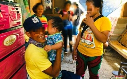 <p><strong>REUNITED.</strong> A couple who are former members of the New People’s Army reunites with their nine-month-old son at his adoptive parents' house in Alabel, Sarangani, on Wednesday (April 1, 2020). The couple, identified only as Bruno and Clara, was deprived of their son’s custody since birth because of the rebels' rule not to allow mothers in their ranks to keep their newborns.<em> (Photo courtesy of 73IB)</em></p>