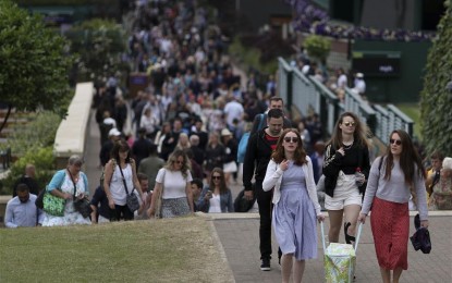 <p><strong>WIMBLEDON</strong>. File photo taken on July 9, 2019 shows spectators arriving during Day 8 of the 2019 Wimbledon Tennis Championships in London, Britain. This year's Wimbledon has been cancelled due to the public health concerns related to the coronavirus disease (Covid-19) pandemic, the All England Club (AELTC) announced on Wednesday. <em>(Xinhua/Han Yan)</em></p>