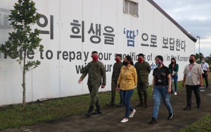 <p><strong>POTENTIAL ISOLATION AREA</strong>. Local government and army engineering officials tour the former military base of the Republic of Korea Armed Forces in Palo, Leyte used by the foreign troops in their recovery effort after Super Typhoon Yolanda struck the province in 2013. The former military base is being prepared as an isolation area for suspected Covid-19 carriers. <em>(Photo courtesy of Army 546th Engineering Battalion)</em></p>