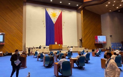 <p><strong>VIRTUAL SESSION</strong>. The House of Representatives convenes in a special session on Monday (March 23) to tackle a measure declaring a national emergency and granting President Rodrigo Duterte additional powers to address the coronavirus outbreak in the country. It is the first time in the chamber’s history to hold a “virtual” session to strictly observe social distancing measures amid the Luzon-wide enhanced community quarantine. <em>(Photo courtesy: Office of the House Majority Leader)</em></p>