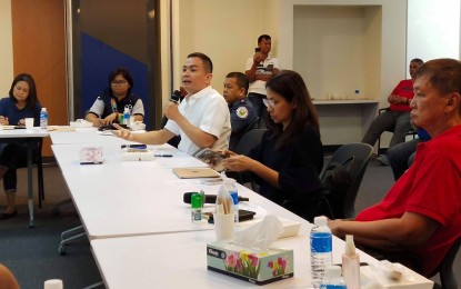 <p><strong>3RD COVID-19 DEATH</strong>. Bataan Governor Albert Garcia, who is also chair of the Provincial Inter-Agency Task Force on Covid-19, reports on the third fatality due to Covid-19 in the province, during a meeting on Sunday, April 5, 2020. He also said that a baby from Mariveles town was among the three latest patients confirmed positive for Covid-19 in Bataan.<em> (Photo by Ernie Esconde)</em></p>