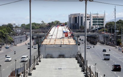 <p><strong>MRT-7.</strong> Photo shows portion of the under construction MRT-7 along Commonwealth Avenue near Sandiganbayan in Quezon City. Cabinet Secretary Karlos Nograles on Tuesday (April 7, 2020) said the inter-agency task force on Covid-19 has allowed the resumption of limited work in 13 rail projects amid the Luzon-wide enhanced community quarantine to contain the spread of the coronavirus disease. <em>(PNA photo by Joey O. Razon)</em></p>