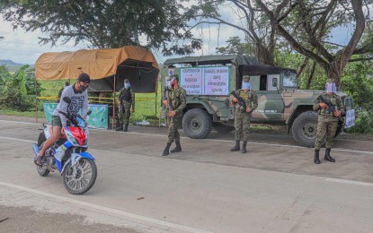 <p><strong>FIGHT VS. COVID-19.</strong> Soldiers manning a checkpoint in Northern Samar as part of its fight against the spread of coronavirus. The Philippine Army has condemned the New People’s Army (NPA) for their extortion activities in poverty-stricken communities of Northern Samar despite the ongoing health crisis. <em>(Photo courtesy of Philippine Army)</em></p>