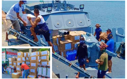 <p><strong>SWIFT DELIVERY.</strong> Soldiers and volunteers of the Bangsamoro Autonomous Region in Muslim Mindanao - Rapid Emergency Action on Disaster Incidence on Thursday work hand-in-hand to load the medical supplies and equipment intended for health units in the Basilan-Sulu-Tawi-Tawi area of the region. The supplies (inset) will augment the dwindling supplies of medicine and equipment of health workers in the BaSulTa island-provinces in the fight against the deadly Covid-19.<em> (Photo courtesy of BARMM-READI)</em></p>