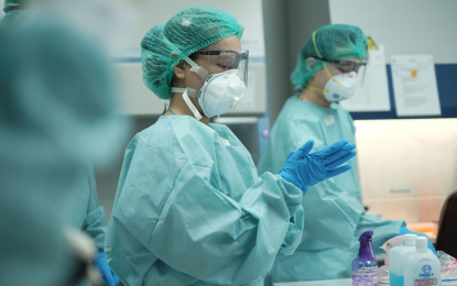 <p><strong>BATTLE-WEARY MEDICAL FRONT-LINERS.</strong> Front-liners on duty at a hospital wear complete protective personal equipment. Heeding medical front-liners’ call for a timeout to prevent the collapse of the country's healthcare system, Pres. Rodrigo Duterte reverted Metro Manila and the provinces of Laguna, Rizal, Cavite and Bulacan to modified enhanced community quarantine starting August 4. <em>(DOH photo)</em></p>