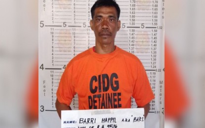 <p><strong>NABBED.</strong> Joint police and military operatives arrest on Saturday (April 11, 2020) Barri Happil, an alleged member of the Abu Sayyaf Group in a law enforcement operation in Barangay Muti, Zamboanga City. <em>(Photo courtesy of Police Regional Office-9 Public Information Office)</em> </p>