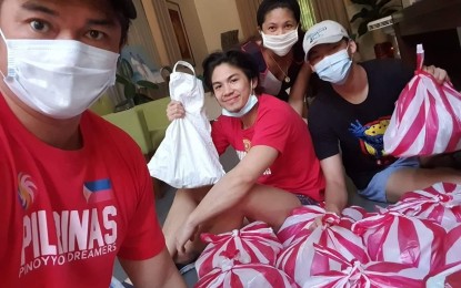 <p><strong>BAYANIHAN THRU SPORTS</strong>. Pinoy Youth Dreamers (PYD) Cares family, led by coach Beaujing Acot, prepare relief assistance for friends in sports affected by the Luzon-wide enhanced community quarantine to contain the coronavirus disease. Acot said PYD also extended assistance to front-liners in various hospitals in Metro Manila. (<em>Contributed photo)</em></p>
