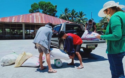 <p><strong>LOCAL PRODUCTS.</strong> To ensure food security amid the 2019 coronavirus disease, the local government of Carrascal in Surigao del Sur has allocated PHP3.5 million to buy the newly-harvested palay and milled rice from the local farmers. Officials say the move is part of the town's broader measures to contain the 2019 coronavirus disease. <em>(Photo courtesy of Carrascal Municipal Agriculture Office)</em></p>