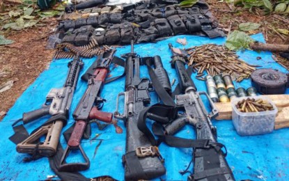 <p><strong>RECOVERED FIREARMS.</strong> Troopers of 3rd Special Forces Battalion of the Army recover five high-powered firearms and other belongings after a 30-minute encounter in Sitio Mikit, Barangay San Martin, Prosperidad, Agusan del Sur, on Friday (April 17, 2020). The Army troopers were providing security to front-liners tasked to release cash assistance through the Social Amelioration Program in the area when fired upon by the communist rebels. <em>(Photo courtesy of CMO 2SFBn)</em></p>