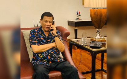 <p><strong>CALL FROM TRUMP.</strong> President Rodrigo Duterte receives a phone call from US President Donald Trump on Sunday night (April 19, 2020). Malacañang on Monday confirmed the two leaders discussed bilateral cooperation against Covid-19 but no other details were announced. <em>(Photo from Sen. Bong Go)</em></p>