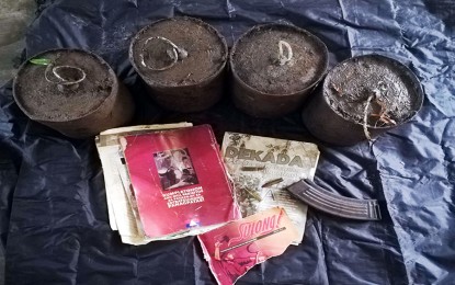 <p><strong>NPA LANDMINES.</strong> Government troops recover four anti-personnel improvised landmines after an encounter Sunday (April 19, 2020) in Sitio Sparcoot, Barangay Gata in San Agustin, Surigao del Sur. The explosives, planted on a farm trail, posed great danger to the lives of the residents in the area, military officials say. <em>(Photo courtesy of 3SFBn)</em></p>