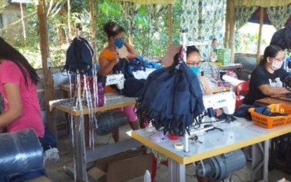 <p><strong>SOCIAL RESPONSIBILITY.</strong> A group of women who availed of skills training from the Iloilo Science and Technology University (ISAT-U) helps mass-produce washable face masks in this undated photo. The university has deemed it as part of its social responsibility to help the government battle Covid-19.<em> (Photo courtesy of Dr. Raul F. Muyong)</em></p>