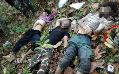 <p><strong>SLAIN BANDITS.</strong> Government troops recover the remains of three of the six Abu Sayyaf Group bandits killed in a clash Wednesday (April 22, 2020) in Barangay Latih, Patikul, Sulu. The military launched the offensive against the bandits following the April 17 firefight that resulted in the death of 12 soldiers and the wounding of 12 others. <em>(Photo courtesy of Joint Task Force Sulu)</em></p>