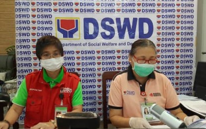 <p><strong>DISMAYED</strong>. Department of Social Welfare and Development Assistant Secretary Rhea Peñaflor (left) on Friday (April 24, 2020) expresses dismay over four Social Amelioration Program beneficiaries who were caught gambling in Anilao, Iloilo on Thursday. The department will await guidelines from the Inter-Agency Task Force on how to deal with beneficiaries who misuse the cash aid. <em>(PNA photo courtesy of DSWD-6)</em></p>