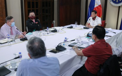 <p><strong>FUNDS FOR COVID-19 RESPONSE. </strong>Finance Secretary Carlos Dominguez III (1st from left), in a taped meeting with President Rodrigo Duterte aired over PTV-4 on Friday (April 24, 2020), says the government has so far spent PHP352.7 billion to address the coronavirus disease 2019 (Covid-19) in the country. </p>
<p>Dominguez said the spent funds for Covid-19 response were taken from the PHP4.1-trillion national budget for 2020, tax collections, savings, and borrowed money from multilateral agencies. <em>(Presidential Photo)</em></p>