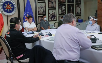 <p>President Rodrigo Duterte holds a meeting with members of the  Inter-Agency Task Force for the Management of Emerging Infectious Diseases (IATF-EID) at the Malago Clubhouse in Malacañang on April 23, 2020. <em>(Presidential Photo)</em></p>
