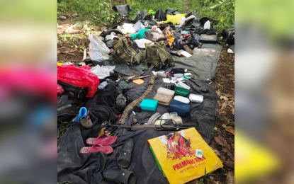 <p><strong>RECOVERED.</strong> Government troops recover an AK-47 rifle, ammunition, assorted medicines, backpacks, and personal belongings following a five-minute firefight with the communist New People's Army in Barangay Nongnong, Butuan City, on Friday (April 24). Residents said the rebels were planning to disrupt the distribution of government assistance in the area. <em>(Photo courtesy of 23IB)</em></p>