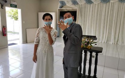 <p><strong>LOVE IN TIME OF COVID-19</strong>. The newlyweds, Daniel and Gracely Villafania-Catchillar, show their wedding rings after their nuptial ceremony on April 27, 2020 at a Kingdom Hall in Sta. Barbara, Pangasinan. The couple tied the knot amid the pandemic and strict requirements due to the enhanced community quarantine in the province. <em>(Photo courtesy of Lito Capua)</em></p>
