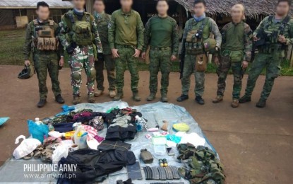 <p><strong>SUCCESSFUL OPS.</strong> Troops from the 41st Infantry battalion recover firearms and other personal belongings from Abu Sayyaf terrorists following a clash in Indanan, Sulu on Tuesday (April 28, 2020). Aside from them, Army commander Lt. Gen. Gilbert Gapay also lauded troops of the 91st Infantry Battalion who recovered high-powered firearms during pursuit operations against New People's Army (NPA) terrorists in Maria Aurora town in Aurora province on April 23, 2020. <em>(Photo courtesy of Army Chief Public Affairs Office)</em></p>