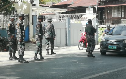 <p><strong>CHECKPOINTS</strong>. The Mangaldan Police checks on vehicles passing by its jurisdiction amid the ongoing Luzon-wide enhanced community quarantine. The Ilocos Police Regional Office attributes the decrease in index crimes in the region to stringent checkpoints, among others. <em>(Photo by Hilda Austria)</em></p>