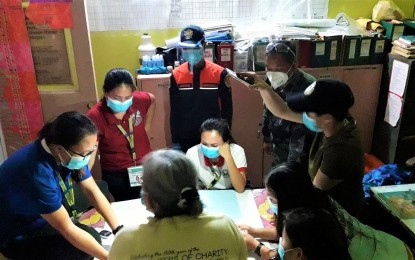 <p><strong>CONTACT TRACING PLAN.</strong> Front-liners in Tarangnan, Samar meet on Thursday night for the contact tracing of residents who had interacted with infected persons. The local government admitted on Friday (May 1, 2020) that local government operations have been paralyzed since several of their workers are under the strict 14-day home quarantine. <em>(Photo courtesy of Tarangnan fire station)</em></p>