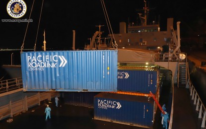<p><strong>PPE CARGO FROM CHINA.</strong> Cargo containers that contain PPE sets are being loaded into the Philippine Navy ship BRP Bacolod City at the Zhangzhou Harbor, Port of Xiamen in China on April 30, 2020. The ship is set to arrive in Davao City on May 8. <em>(Photo courtesy of Naval Public Affairs Office)</em></p>