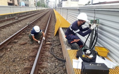 <p><strong>WORKS RESUME AT LRT-1.</strong> Personnel of the Light Rail Transit Line 1 (LRT-1) conduct maintenance works after being given the green light by government regulators. The Light Rail Manila Corporation (LRMC) on Tuesday said works for the LRT-1 Cavite Extension resumed, aside from improvement works that would benefit commuters once the enhanced community quarantine is lifted in Metro Manila. <em>(Photo courtesy of LRMC)</em></p>