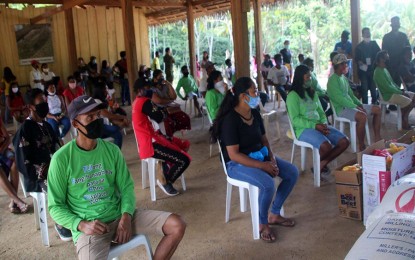 <p><strong>RELIEF FOR EX-REBELS.</strong> A total of PHP844,800 is handed over to 88 former members of the communist New People’s Army on Wednesday (May 6, 2020) in Sitio Ibuan, Barangay Mampi, Lanuza, Surigao del Sur. The cash aid is under the Department of Labor and Employment's Tulong Panghanapbuhay sa Ating Disadvantaged/Displaced Workers program.<em> (Photo courtesy of 36IB)</em></p>