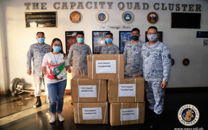 <p><strong>PPE DONATION.</strong> Navy officials receive sets of personal protective equipment donated by PLDT-Smart Foundation Inc. at the Navy headquarters in Manila on Wednesday (May 6, 2020). The PPE sets will be transported and distributed to different PN units and hospitals such as Manila Naval Hospital and Cavite Naval Hospital. <em>(Photo courtesy of Naval Public Affairs Office)</em></p>