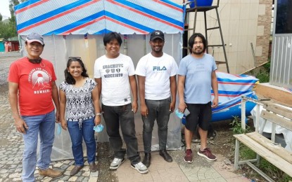 <p><strong>NECESSITY BREEDS INNOVATION</strong>. The disinfection cabin team members Engr. Marlon Rojo, Engr. Eunelfa Regie Calibara, Engr. Jolan Sy, Engr. Wubishet Degife (Ethiopian) and Engr. Alain Vincent Comendador. A team of Filipino expatriate engineers and teachers in Amhara Region in north-central Ethiopia innovated a disinfection cabin for exposed clothing and skin that may be contaminated with coronavirus. <em>(Photo courtesy of Wollo University Filipino team members).</em></p>