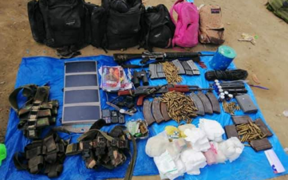 <p><strong>ARMED ENCOUNTER.</strong> The Army's 71st Infantry Battalion recovers two high-power firearms, an improvised explosive device, and other war materiel after a firefight with the communist New People’s Army in Barangay Pangibiran, Mabini, Davao de Oro, on Monday (May 11, 2020). Military officials say the crash occurred after the troops responded to the complaints of the residents in the area about the rebels' harassment. <em>(Photo courtesy of 71IB)</em></p>