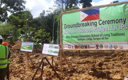 <p><strong>TRIBAL SCHOOL.</strong> Members of the Manobo tribe welcome the start of the construction of the Sitio Simuwao School of Living Traditions in Barangay Diatagon, Lianga, Surigao del Sur on Tuesday (May 12, 2020). The new school is an initiative of the local tribal council and supported by the multi-sectoral Regional Task Force to End Local Communist Armed Conflict. <em>(Photo courtesy of 3SFBn)</em></p>