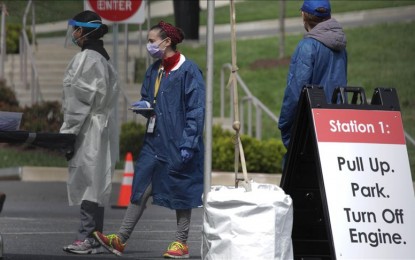 <p>Health officers are seen at a site which built for screening people for the coronavirus disease 2019 (Covid-19) in Washington, DC, United States in April 2020.<em> (Yasin Öztürk-Anadolu Agency)</em></p>