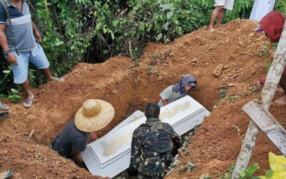 <p><strong>DECENT BURIAL.</strong> Officials of the Zamboanga del Sur town of Midsalip provide a decent burial for the two slain communist New People's Army rebels on Tuesday (May 12, 2020). The rebels were killed in a clash on May 11 with the Army's 53rd Infantry Battalion troops in Barangay Balonai, Midsalip. <em>(Photo courtesy of Army's 53rd Infantry Battalion)</em></p>