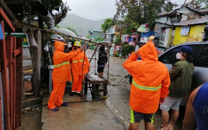 <p><strong>DAMAGE CHECK.</strong> Local officials in Catbalogan City, Samar monitor the situation during the onslaught of Typhoon Ambo (Vongfong) on May 14, 2020. Nearly 200 families in the city who moved to safer grounds returned home on Friday (May 15, 2020) as the weather improved a day after the typhoon crossed Samar Island.<em> (Photo courtesy of Mayor Dexter Uy)</em></p>