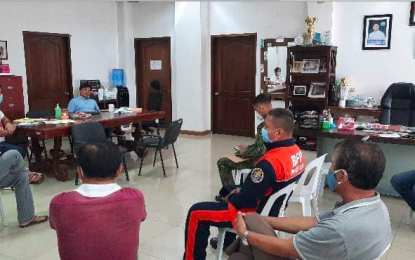 <p><strong>BRACING FOR 'AMBO'</strong>. Piddig, Ilocos Norte Mayor Eduardo Guillen presides a meeting with members of the Municipal Disaster Risk Reduction and Management Council in preparation for Typhoon "Ambo" (Vongfong) on Friday (May 15, 2020). The Provincial Disaster Risk Reduction and Management and Resiliency Council (PDRRMRC) of Ilocos Norte has issued a temporary ban on fishing due to prevailing rough seas. <em>(Photo from Piddig, Ilocos Norte's Facebook page)</em></p>