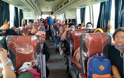<p><strong>BACK HOME.</strong> The 38 residents of Maguindanao who were stranded in Davao City following the imposition of the enhanced community quarantine to contain the 2019 coronavirus disease are now in their respective towns. The returning Maguindanaons still have to complete their 14-day home quarantine before they could be with family members.<em> (Photo by Maguindanao PIO)</em></p>